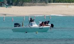 th_208063573_RihannaenjoysafunridewithfriendsonaboatinBarbados_44_122_29lo.jpg